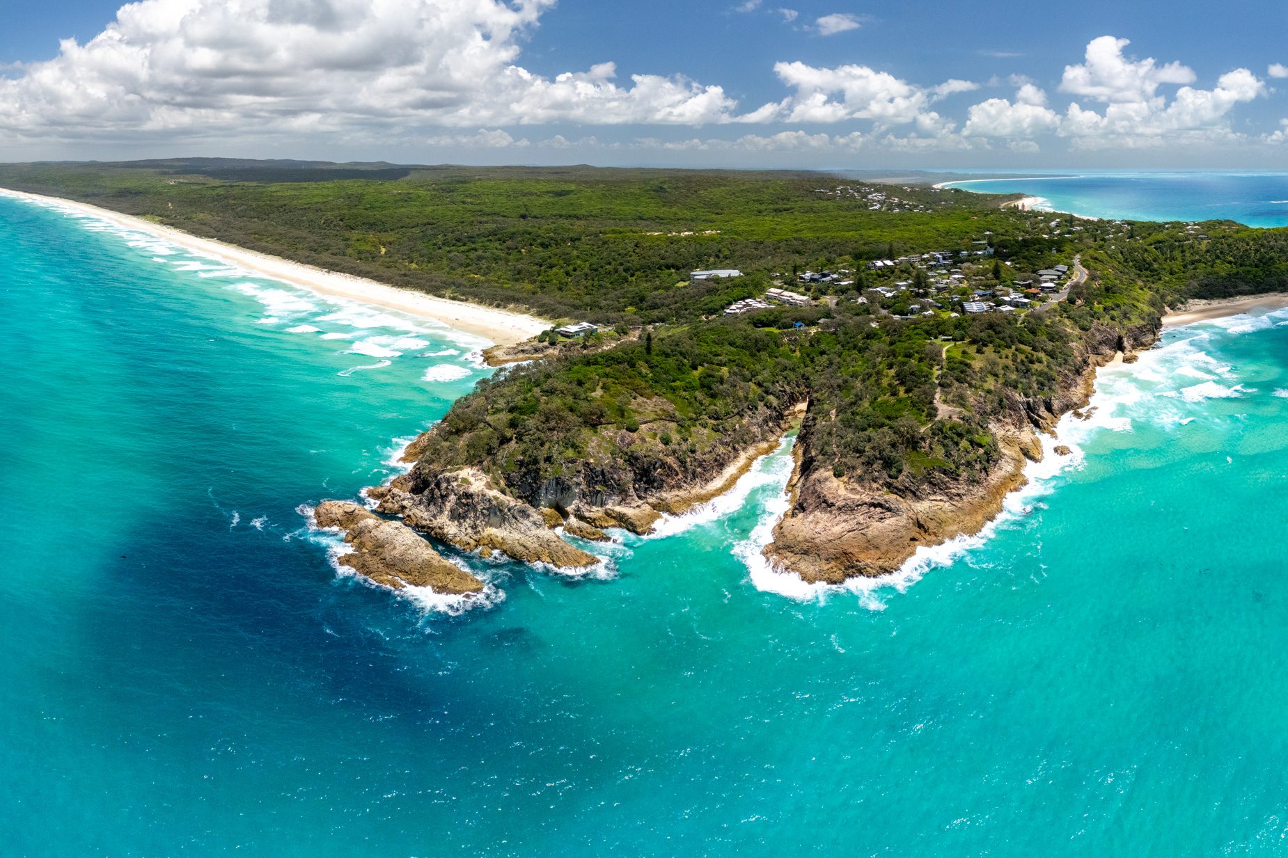 Point Lookout headland from the air, with the North Gorge and Main Beach beyond