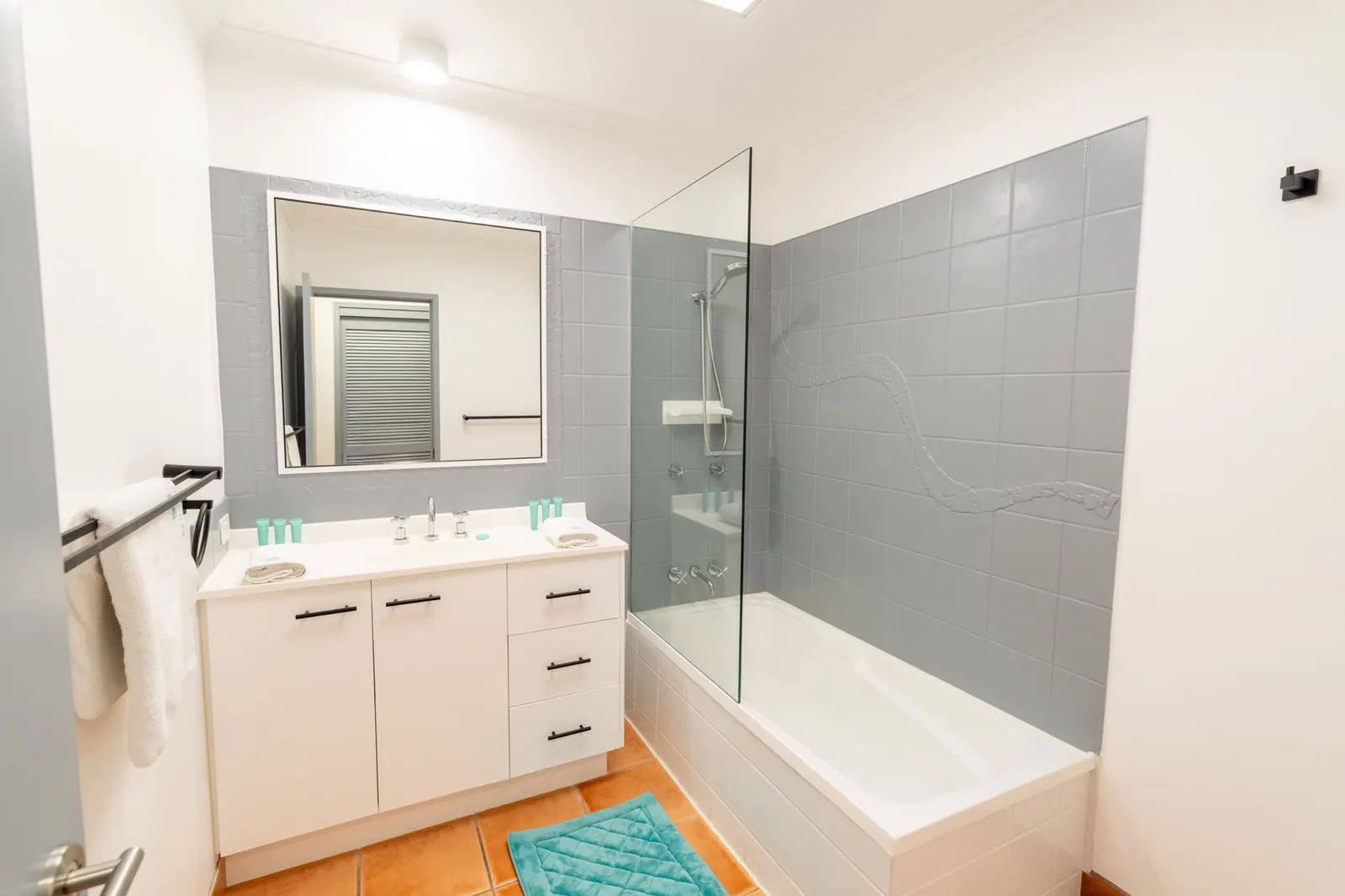 The bathroom inside a Deluxe Ocean villa at Pandanus Palms Resort