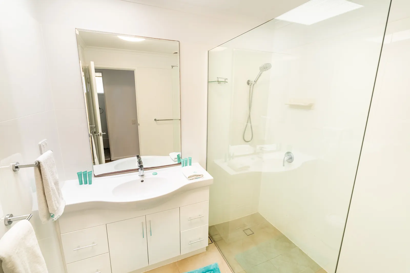 The bathroom inside a Premium Headland Ocean villa at Pandanus Palms Resort