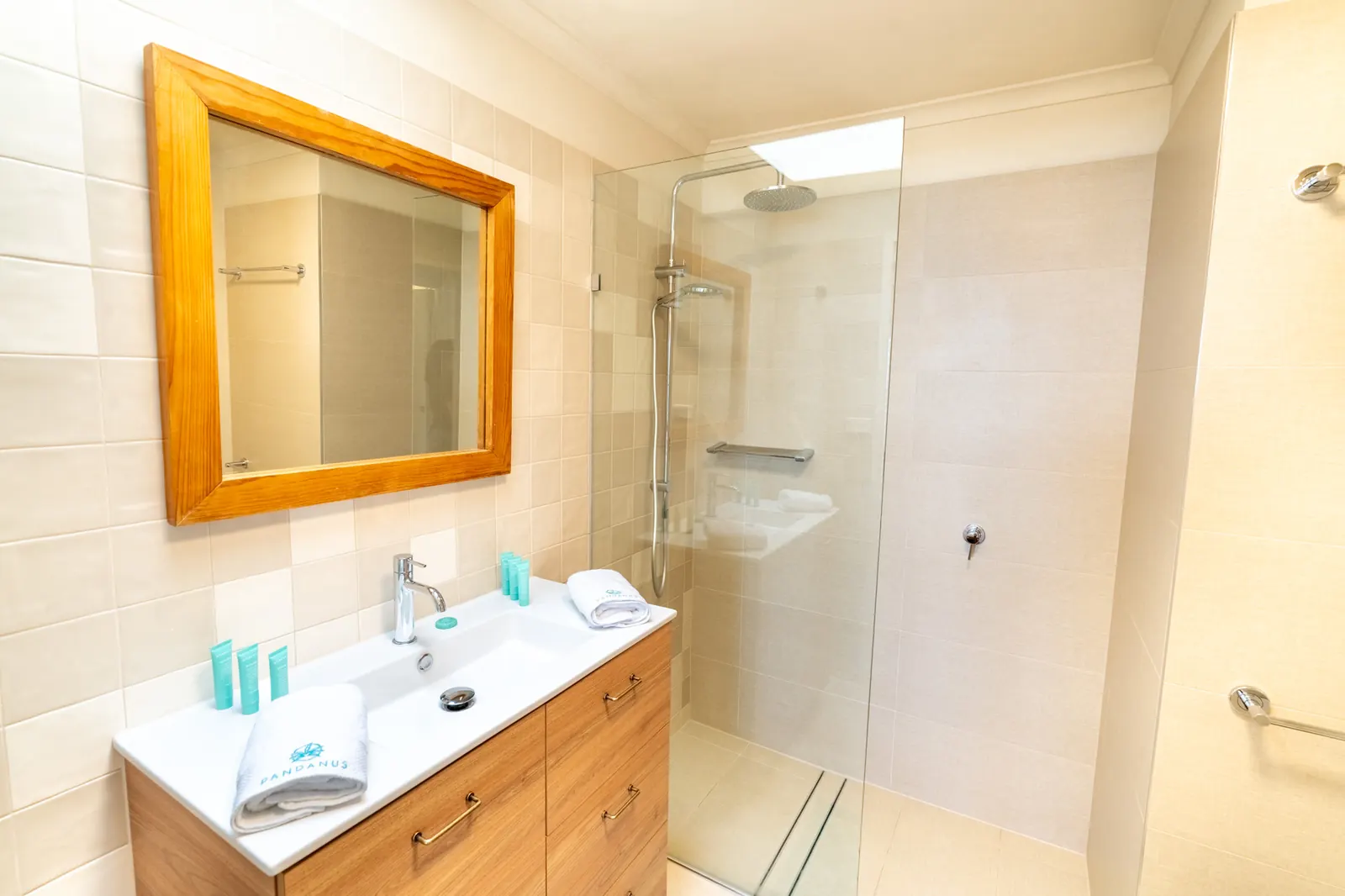 The bathroom inside a Prestige Headland Ocean villa at Pandanus Palms Resort