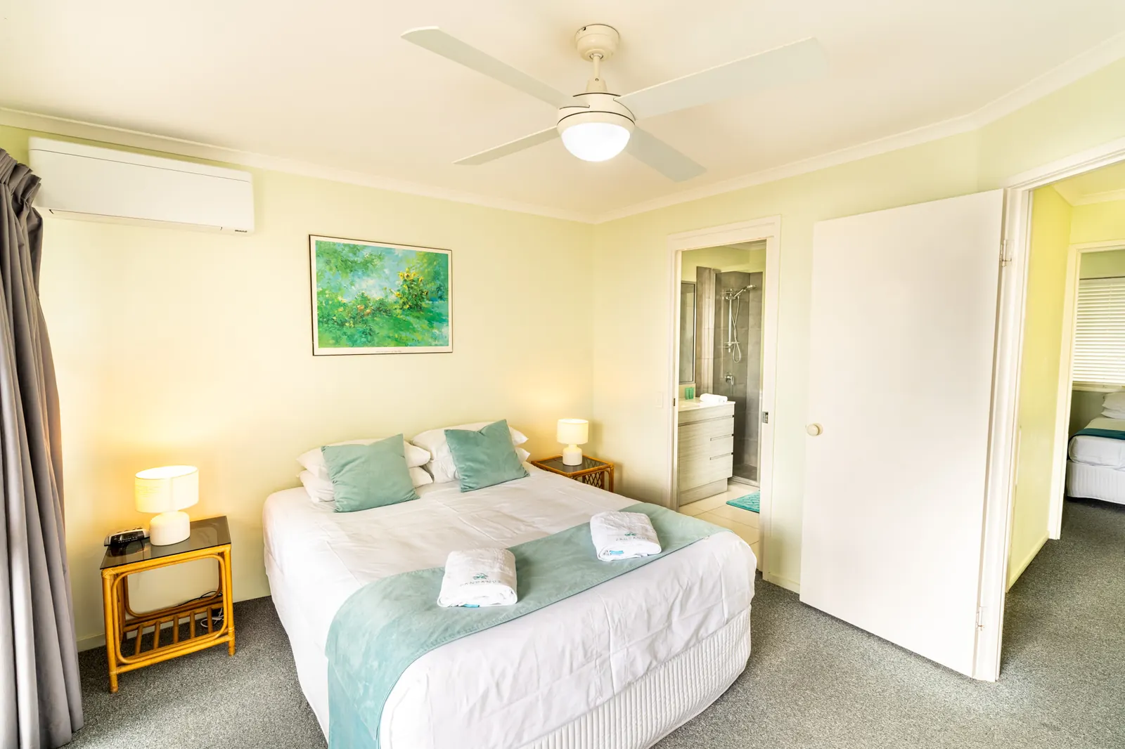 A bedroom inside a Standard Ocean villa at Pandanus Palms Resort